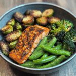 Spiced Salmon Bowl with Roasted Brussels, Sautéed Greens & Steamed Broccoli